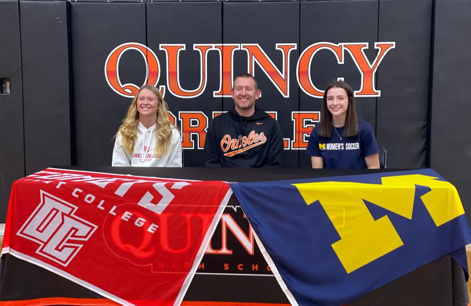 The Quincy duo of Kallie Glei (left) and Abigail Harmon (right) sat down together and signed their respective letters of intent to play soccer at the college level.