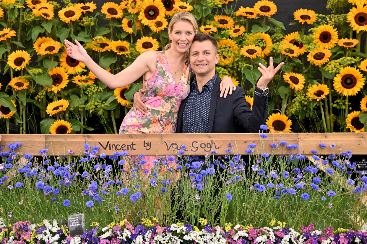 SOUTHPORT, ENGLAND - AUGUST 18: Rachel Riley and Pasha Kovalev in a Silver-Gilt Medal winning display by Poplar Farm Flowers on August 18, 2023 in Southport, England. (Photo by Anthony Devlin/Getty Images)