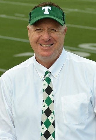 Rob Saxton will retire as Trinity High School's director of athletics in June.