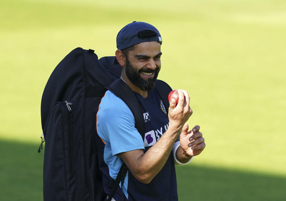 India's Virat Kohli smiles during the nets session at Old Trafford, Manchester, England, Wednesday Sept. 8, 2021 ahead of the fifth cricket test against England. (Martin Rickett/PA via AP)