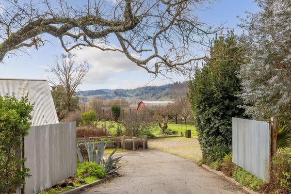 The revamped property sits tucked behind a gated entrance.