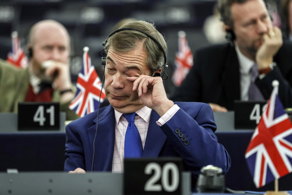 Former U.K. Independence Party (UKIP) leader and member of the European Parliament Nigel Farage attends a session at the European Parliament in Strasbourg, eastern France, Wednesday, March 13, 2019. British lawmakers rejected May's Brexit deal in a 391-242 vote on Tuesday night. Parliament will vote Wednesday on whether to leave the EU without a deal. (AP Photo/Jean Francois Badias)