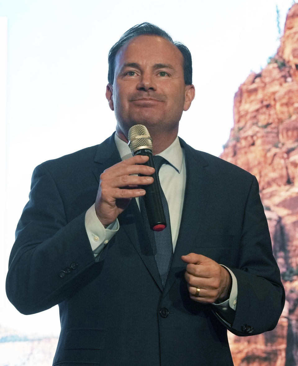 U.S. Sen. Mike Lee, of Utah, speaks to supporters during a Utah Republican election night party, Tuesday, June 28, 2022, in South Jordan, Utah. (AP Photo/George Frey)