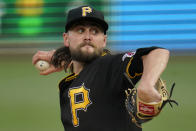 Pittsburgh Pirates starting pitcher JT Brubaker delivers during the first inning of the team's baseball game against the Philadelphia Phillies in Pittsburgh, Saturday, July 31, 2021. (AP Photo/Gene J. Puskar)