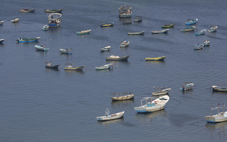 Palestinian fishing boats moored in the Gaza seaport in Gaza City, Thursday, June 13, 2019. The Israeli military took the rare step of closing the Gaza Strip's offshore waters to Palestinian fishermen Wednesday until further notice in response to incendiaries launched into Israel in recent days. (AP Photo/Hatem Moussa)