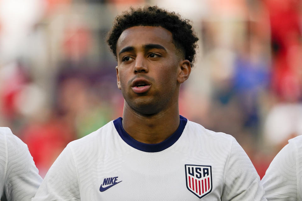 FILE United States midfielder Tyler Adams, center, stands for the national anthems prior to the first half of a friendly soccer match against Morocco, Wednesday, June 1, 2022, in Cincinnati. Leeds manager Jesse Marsch acknowledges last season’s relegation battle was “intensely stressful.” A preseason trip Down Under for the American and his squad — now featuring two compatriots in midfielders Brenden Aaronson and Tyler Adams — has been more laid-back. Along with a few friendly matches, the team went surfing and got up close with kangaroos at Perth Zoo. (AP Photo/Jeff Dean, File)