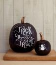 <p>You can write out a new spooky message every day with the help of a versatile coat of <a href="https://www.amazon.com/Rust-Oleum-1913-830-1913830-Chalkboard-11-Ounce/dp/B000RMPLJ6/?tag=syn-yahoo-20&ascsubtag=%5Bartid%7C10052.g.38066841%5Bsrc%7Cyahoo-us" rel="nofollow noopener" target="_blank" data-ylk="slk:chalkboard paint;elm:context_link;itc:0;sec:content-canvas" class="link ">chalkboard paint</a>. Better yet, you can display a countdown until Halloween or a menu if you're throwing a dinner party.</p><p>Get the tutorial at <em><a href="https://www.countryliving.com/diy-crafts/g1350/pumpkin-decorating-1009/?slide=98" rel="nofollow noopener" target="_blank" data-ylk="slk:Country Living;elm:context_link;itc:0;sec:content-canvas" class="link ">Country Living</a></em><em>.</em></p>