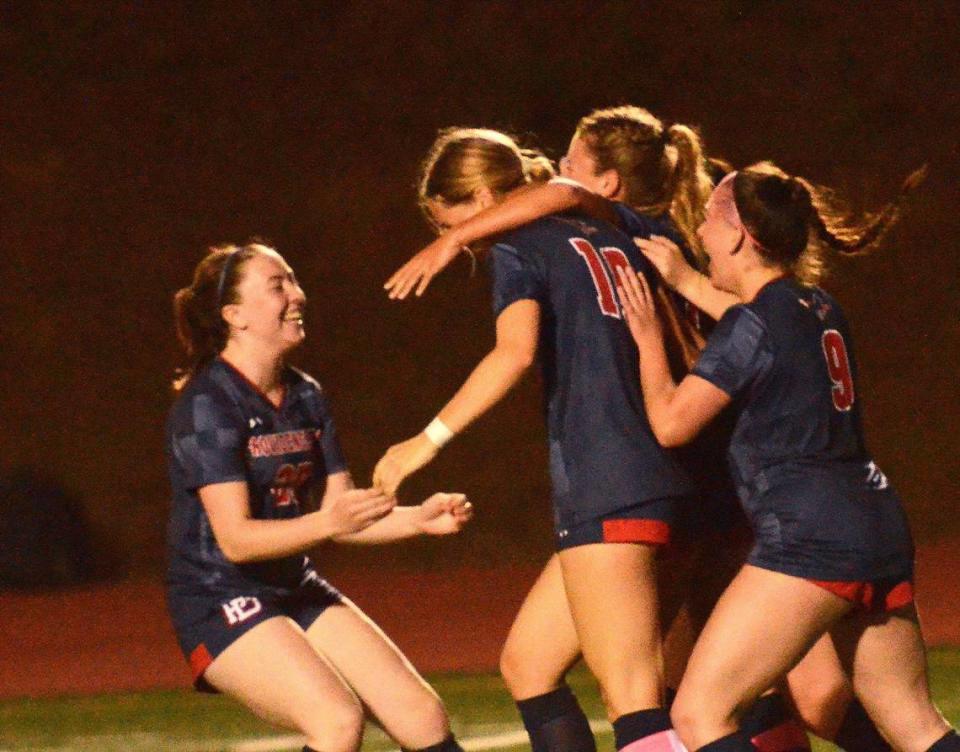 Providence Day forward #7 KK Hart (center of scrum) is congratulated by her teammates after she scored the only goal of the first half. Unbeaten Charlotte Latin visits unbeaten Providence Day for a much anticipated girls soccer match. Both teams are ranked among the nation’s top 10. They faced off on Tuesday, April 2, 2024.