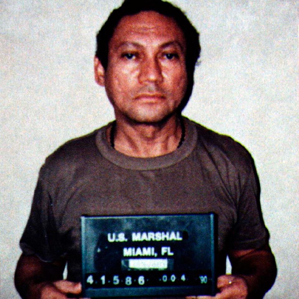 Former Panamanian dictator Manuel Noriega is seen during his arrest by U.S. Drug Enforcement Agency agents in this 1990 photo - Credit: Reuters