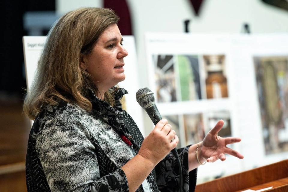 Kellie Spencer, the deputy superintendent for operations in the Fort Worth Independent School District, speaks to the crowd gathered for a FWISD community listening session at Daggett Middle School in Fort Worth on Thursday.