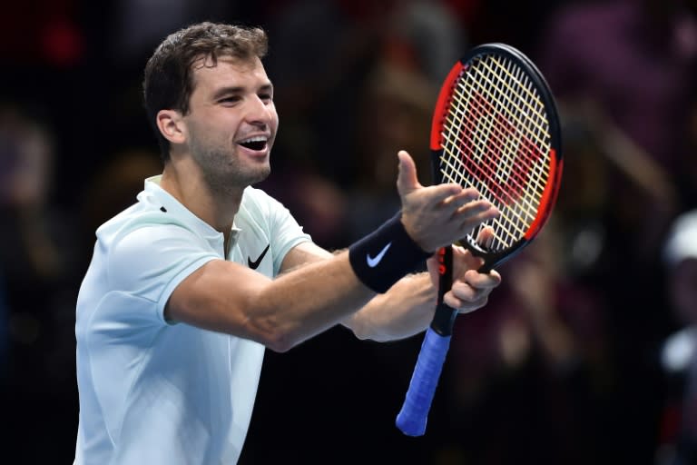 Bulgaria's Grigor Dimitrov celebrates after defeating Austria's Dominic Thiem in the ATP World Tour Finals, at the O2 Arena in London, on November 13, 2017