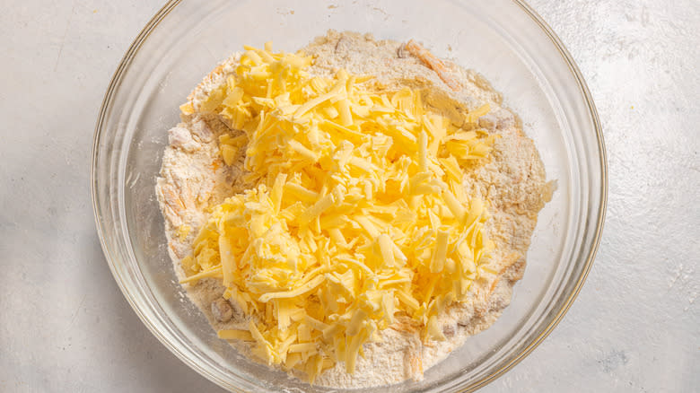 Bowl with flour, and shredder butter