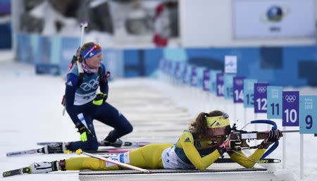 Biathlon - Pyeongchang 2018 Winter Olympics - Women's 15km Individual Final - Alpensia Biathlon Centre - Pyeongchang, South Korea - February 15, 2018 - Hanna Oeberg of Sweden shoots. REUTERS/Toby Melville