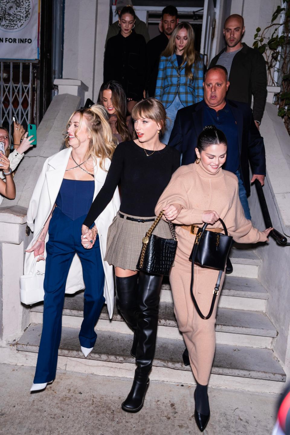 Taylor Swift, center, was spotted hanging out in New York City on Saturday with friends Selena Gomez, right, Brittany Mahomes, left, Sophie Turner, back center, and Gigi Hadid, back left.