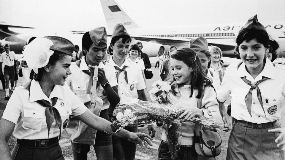 Samantha Smith, a fifth-grader from Manchester, Maine, is greeted by Russian Young Pioneers at an airport on the Crimean Peninsula, July 9, 1972.  / Credit: Hulton Archive/Getty Images