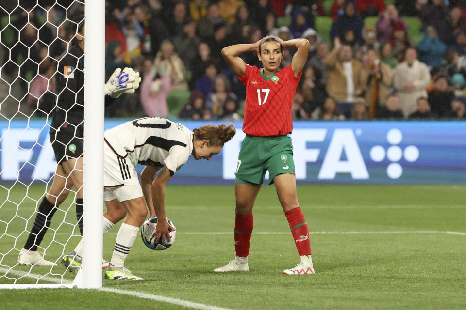 Morocco's Hanane Ait El Haj, right, reacts after scoring an own goal during the Women's World Cup Group H soccer match between Germany and Morocco in Melbourne, Australia, Monday, July 24, 2023. (AP Photo/Hamish Blair)