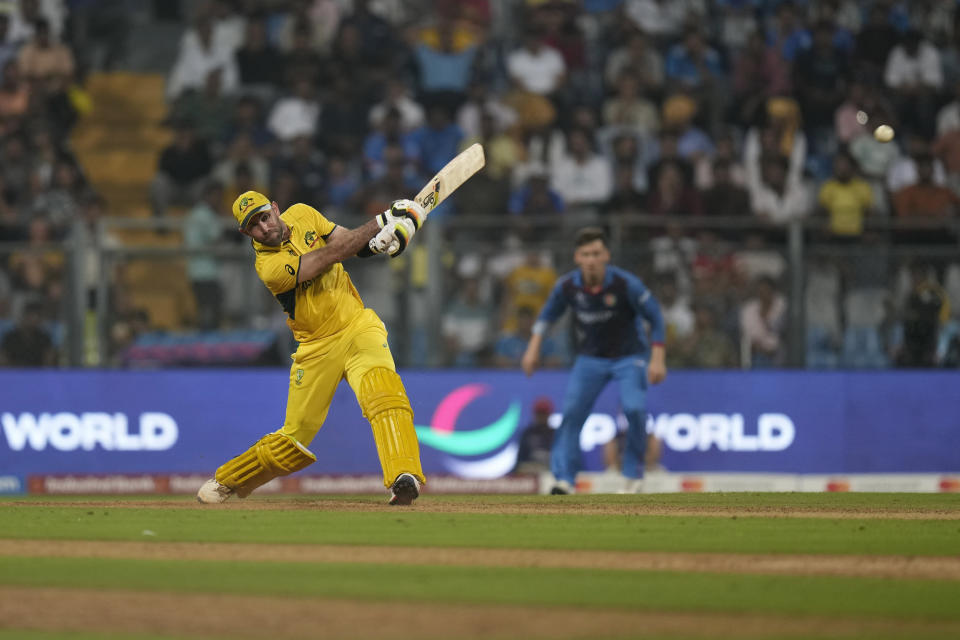 Australia's Glenn Maxwell plays a shot during the ICC Men's Cricket World Cup match between Australia and Afghanistan in Mumbai, India, Tuesday, Nov. 7, 2023. (AP Photo/Rajanish Kakade)