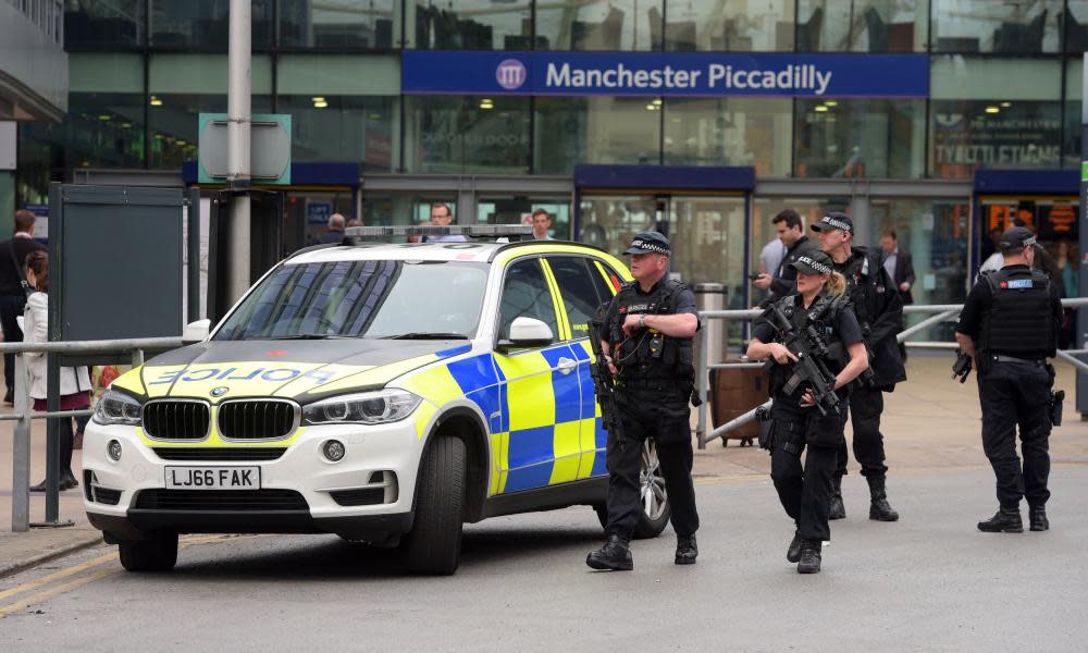 Armed police outside Manchester Piccadilly station in Manchester.