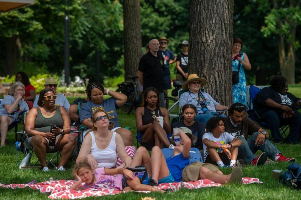 Community members gather at Thompson Park for the second annual Advocacy and Awareness Peace March and Rally on Juneteenth, Saturday, June 19, 2021, in Overland Park, Kansas. Members of the community gathered to hear speakers and watch performers at the rally.