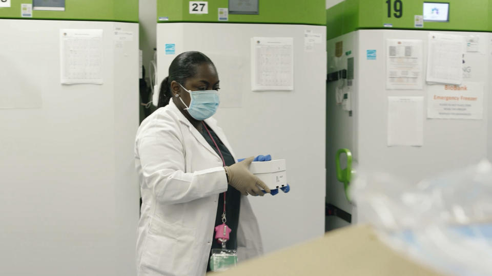 This Monday, Nov. 23, 2020 photo from video provided by Cedars-Sinai Medical Center in Los Angeles shows the room where they will store coronavirus vaccines in super-cold storage. As California recorded a record of nearly 35,500 positive coronavirus cases on Friday, Dec. 11, 2020,, there is a glimmer of hope. California is awaiting the first batch of coronavirus vaccine and planning to distribute it to hospitals to inoculate healthcare workers on the front lines of the pandemic. The state is expecting to receive 327,000 doses of Pfizer's vaccine by early next week. (Cedars-Sinai via AP)