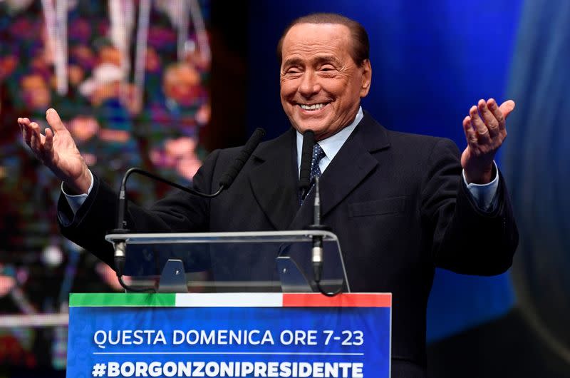 FILE PHOTO: Former Italian Prime Minister and leader of the Forza Italia party Silvio Berlusconi gestures during a rally ahead of a regional election in Emilia-Romagna, in Ravenna