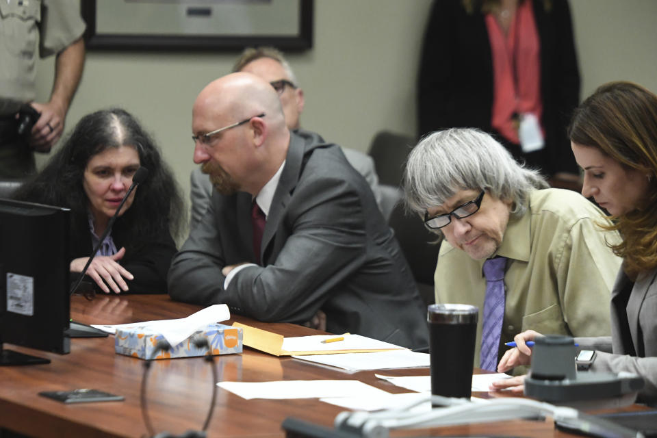 David Turpin and wife, Louise sit in a courtroom during their sentencing hearing Friday.