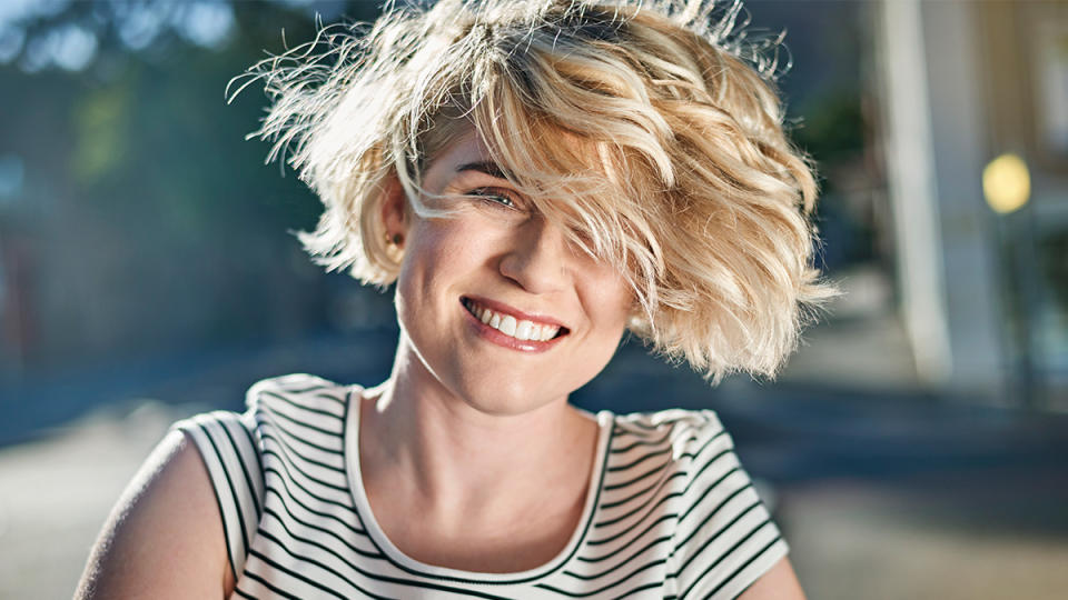 Woman with short wavy hair