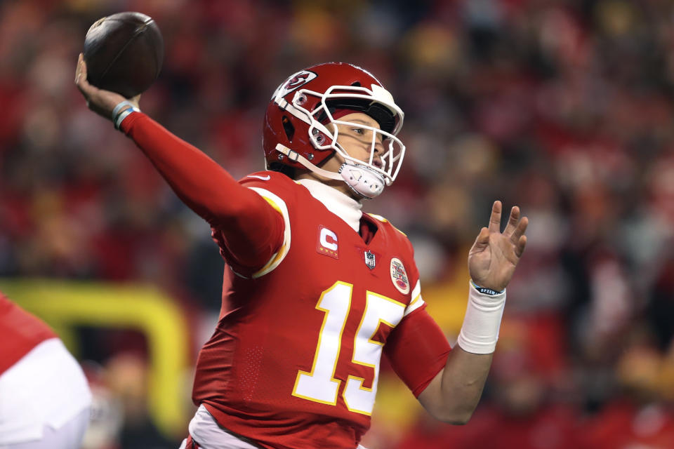 Kansas City Chiefs quarterback Patrick Mahomes (15) throws a pass during the first half of an NFL wild-card playoff football game against the Pittsburgh Steelers, Sunday, Jan. 16, 2022, in Kansas City, Mo. (AP Photo/Travis Heying)