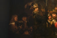 Detail of the Night Watch's left side, showing how Rembrandt's biggest painting just got bigger with the help of artificial intelligence in Amsterdam, Netherlands, Wednesday, June 23, 2021. The Dutch national museum and art gallery reveals findings from a long-term project to examine in minute detail Rembrandt van Rijn's masterpiece the Night Watch. (AP Photo/Peter Dejong)