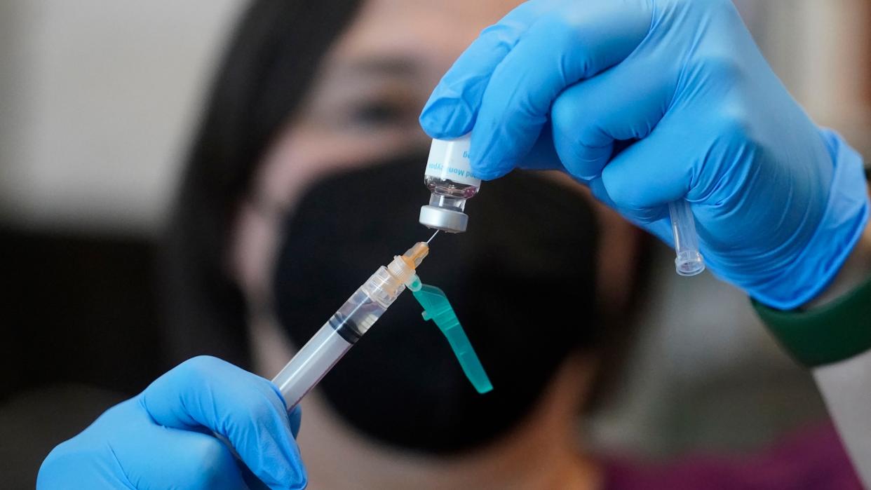 FILE - A registered nurse prepares a dose of a Monkeypox vaccine at the Salt Lake County Health Department Thursday, July 28, 2022, in Salt Lake City. 