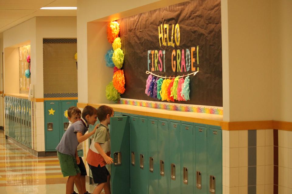 Students get a look at the lockers inside Pell Elementary School in 2022.