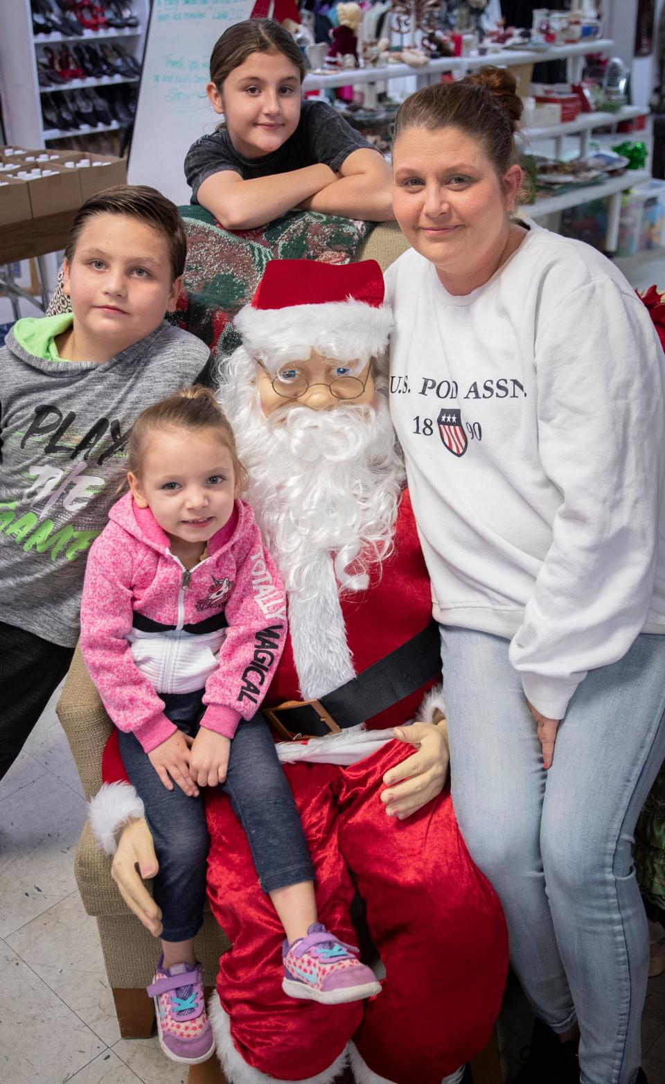 Anna Huff and her children are one of the families who benefit from the Empty Stocking Fund.  Huff and her children, Jewelia, 13, Michael, 8, and Madilyn, 3, were photographed at the Salvation Army Thrift Store in Panama City, Friday, December 10, 2021. 