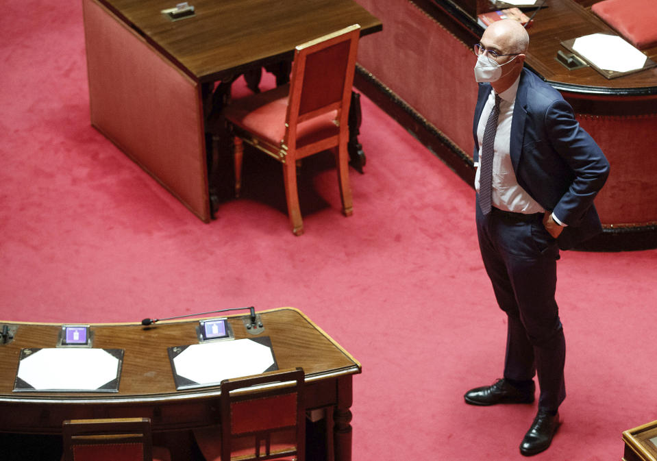 Minister for Parliamentary Relations Federico D'Inca' stands at the Senate before a vote on a relief bill, in Rome, Thursday, July 14, 2022. The survival of Italian Premier Mario Draghi’s government hung in the balance Thursday ahead of a crucial Senate vote on a relief bill for soaring energy costs, after a key ally vowed to boycott the measure. While senators publicly debated the bill, which extends gasoline subsidies expiring within days, backdoor maneuvering by allies in Draghi's 17-month-old pandemic unity government explored possible strategy to avoid risking the premier's stepping down. (Roberto Monaldo/LaPresse via AP)