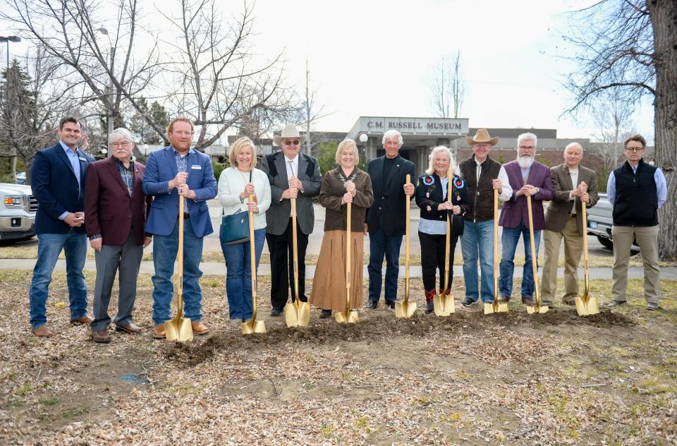 Dignitaries pose with golden shovels during the groundbreaking ceremony for the C.M. Russell Museum's expanded campus on March 19, 2021.