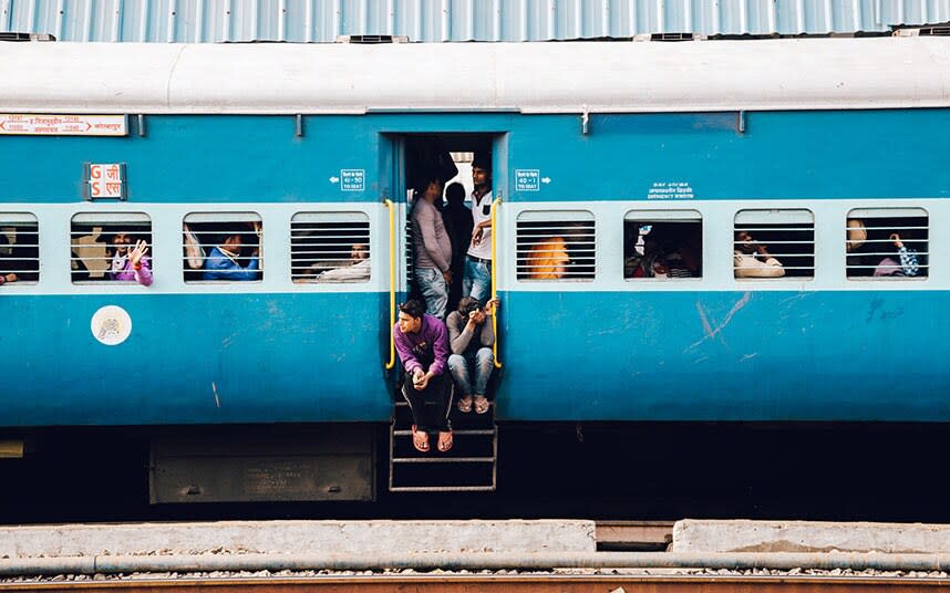 The Indian rail network carries in excess of 23 million people - istock