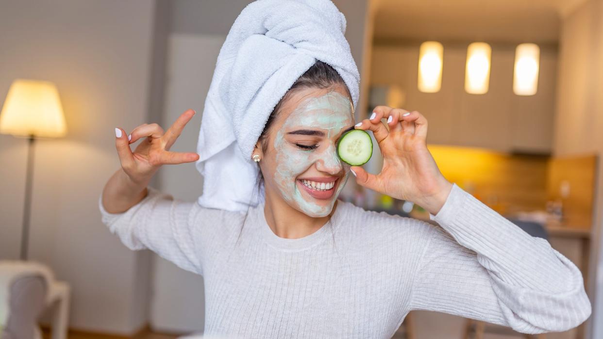girl with face mask at home