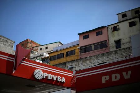 The logo of the Venezuelan state oil company PDVSA is seen at a gas station in Caracas, Venezuela on June 30, 2016. REUTERS/Carlos Garcia Rawlins/File Photo