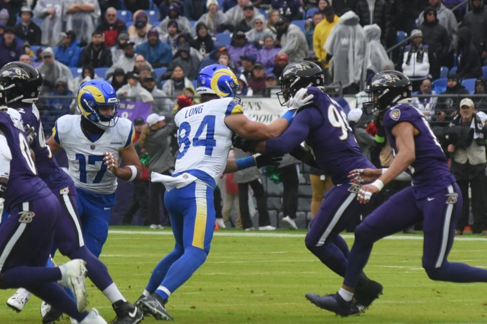 Los Angeles Rams tight end Hunter Long, a 2016 graduate of Exeter High School, blocks Baltimore Ravens' Odafe Oweh during the first quarter of Sunday's NFL game at M and T Bank Stadium in Baltimore.