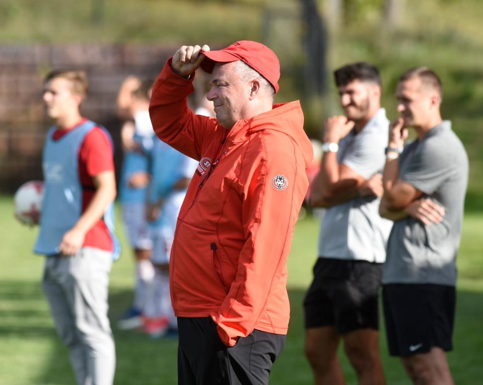 St. Cloud State head coach Sean Holmes stands on the sidelines Wednesday, Sept. 8, 2021, at Haws Field in Collegeville. 