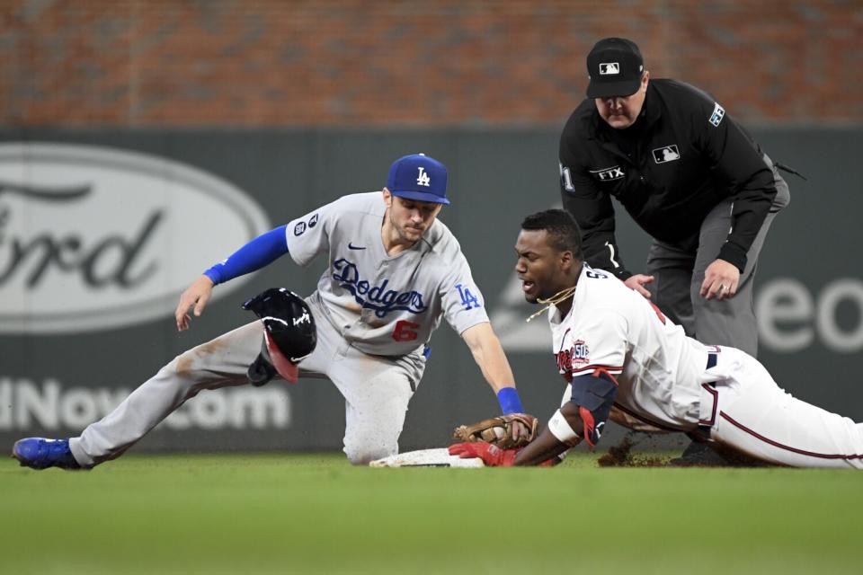 Atlanta Braves' Jorge Soler dives into second base.