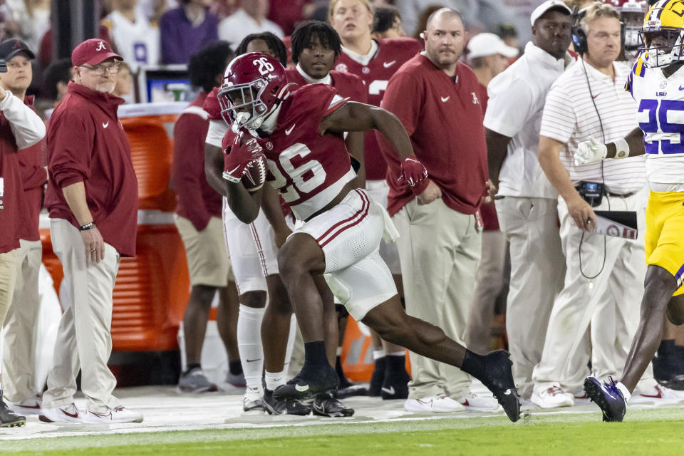 Alabama running back Jam Miller runs the ball against LSU during the second half of an NCAA college football game, Saturday, Nov. 4, 2023, in Tuscaloosa, Ala. (AP Photo/Vasha Hunt)