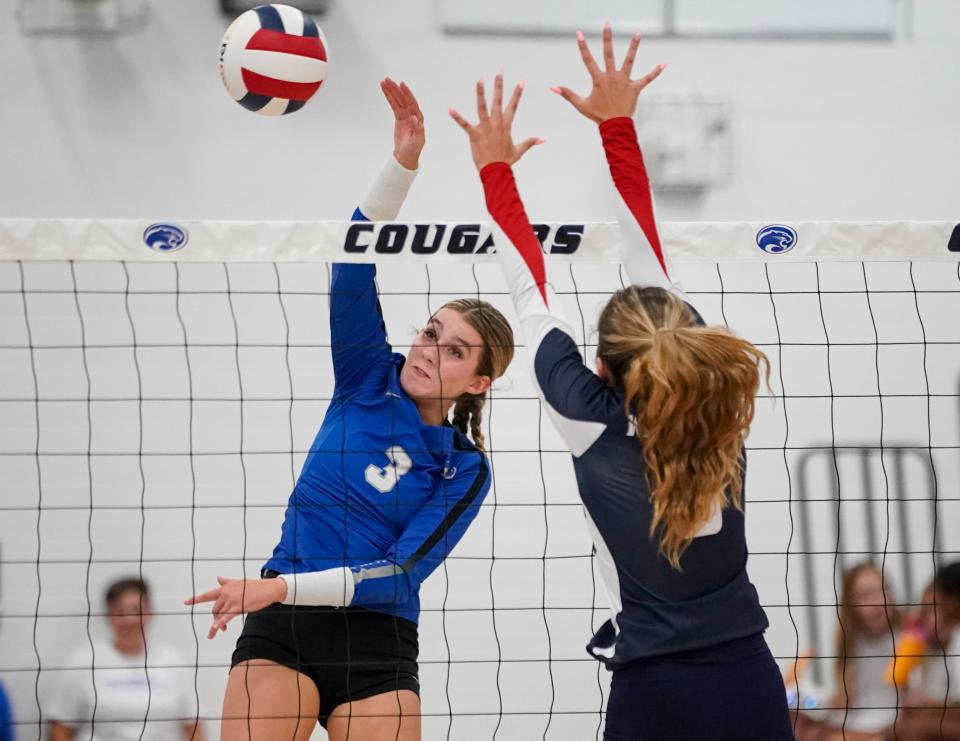 Canterbury Cougars outside hitter Brighten Sedmack (3) goes for a kill against the Estero Wildcats during a preseason jamboree at the Canterbury School in Fort Myers on Tuesday, Aug. 15, 2023.