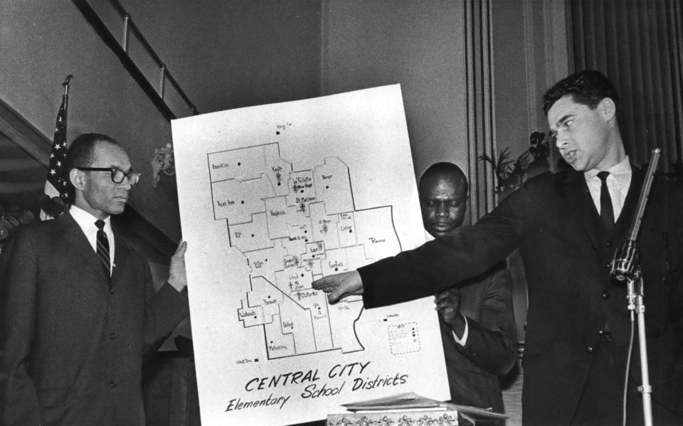 Organizers Lloyd Barbee (from left), Theodore Mack and Thomas Jacobson discuss plans for a Milwaukee Public Schools boycott March 1, 1964, at St. Mark AME Church, 1876 N. 11th St.