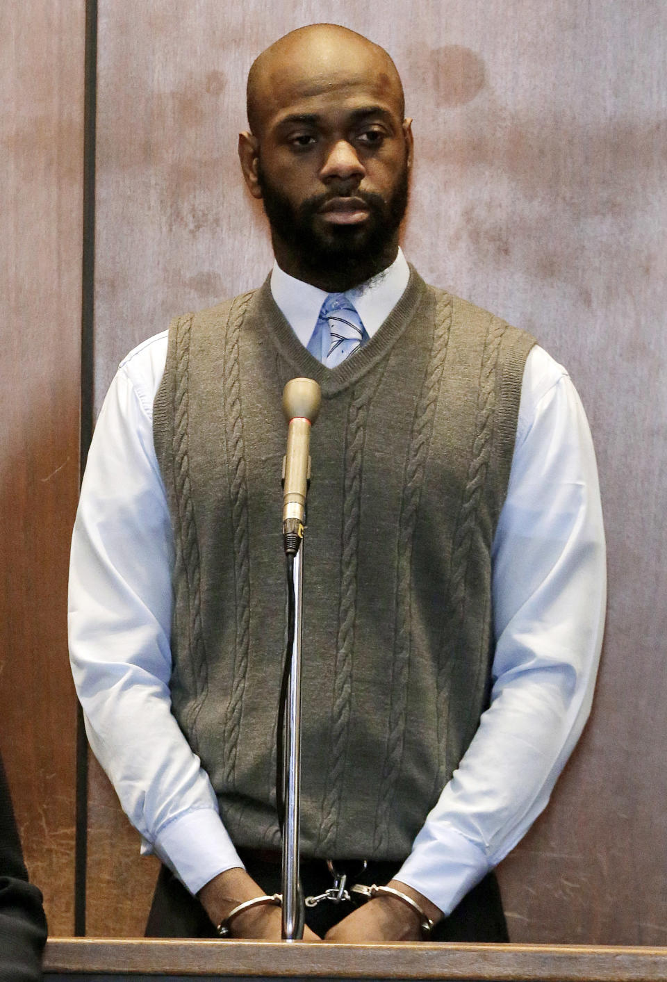 Hanif Thompson, 29, one of four accused in the Dec. 15, 2013, carjacking at The Mall at Short Hills, where Dustin Friedland, of Hoboken, was fatally shot as he returned with his wife to their vehicle, appears for an arraignment hearing at Essex County Superior Court, Wednesday, Jan. 8, 2014, in Newark, N.J. Karif Ford, 31, Basim Henry, 32, and Kevin Roberts, 33, were also charged during the morning arraignment. All four pleaded not guilty. Each has been charged with murder, felony murder, carjacking, conspiracy, possession of a weapon and possession of a weapon for unlawful purpose. (AP Photo/Julio Cortez)