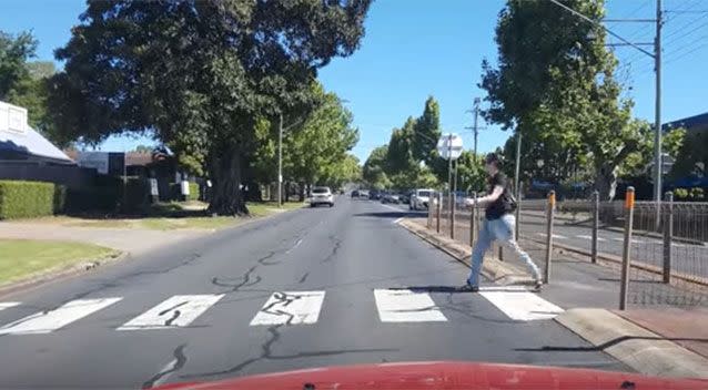 The pedestrian was casually crossing the road. Image: YouTube