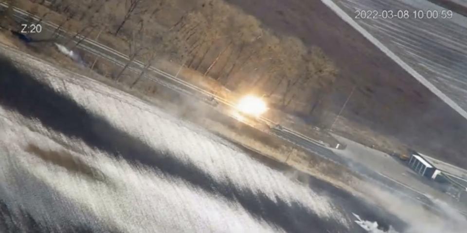 A screenshot from a video released by the Ukrainian defense ministry, showing a road outside Borodyanka with a burst of fire where Russian vehicles were reportedly targeted