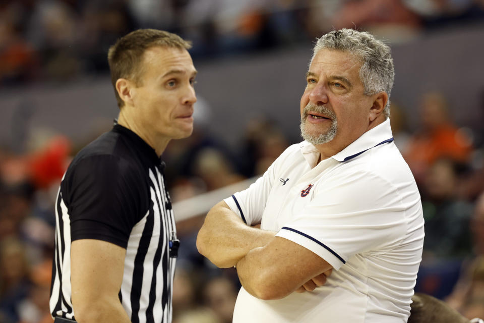 Auburn head coach Bruce Pearl reacts as a referee talks to him about a call during the second half of an NCAA basketball game against USC, Sunday, Dec. 17, 2023, in Auburn, Ala. (AP Photo/Butch Dill)