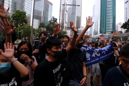 Supporters of jailed activist Leung, gather outside the High Court as Leung appeals against a conviction and sentence in Hong Kong