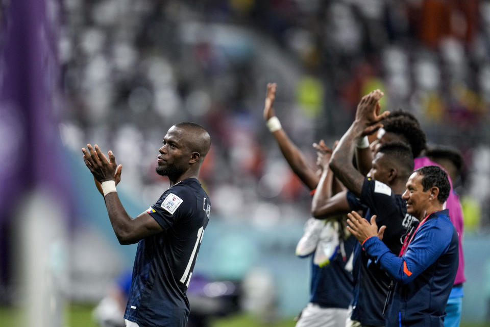 Ecuador's Enner Valencia, left, applauds at the end of the World Cup group A soccer match between Netherlands and Ecuador, at the Khalifa International Stadium in Doha, Qatar, Friday, Nov. 25, 2022. (AP Photo/Natacha Pisarenko)