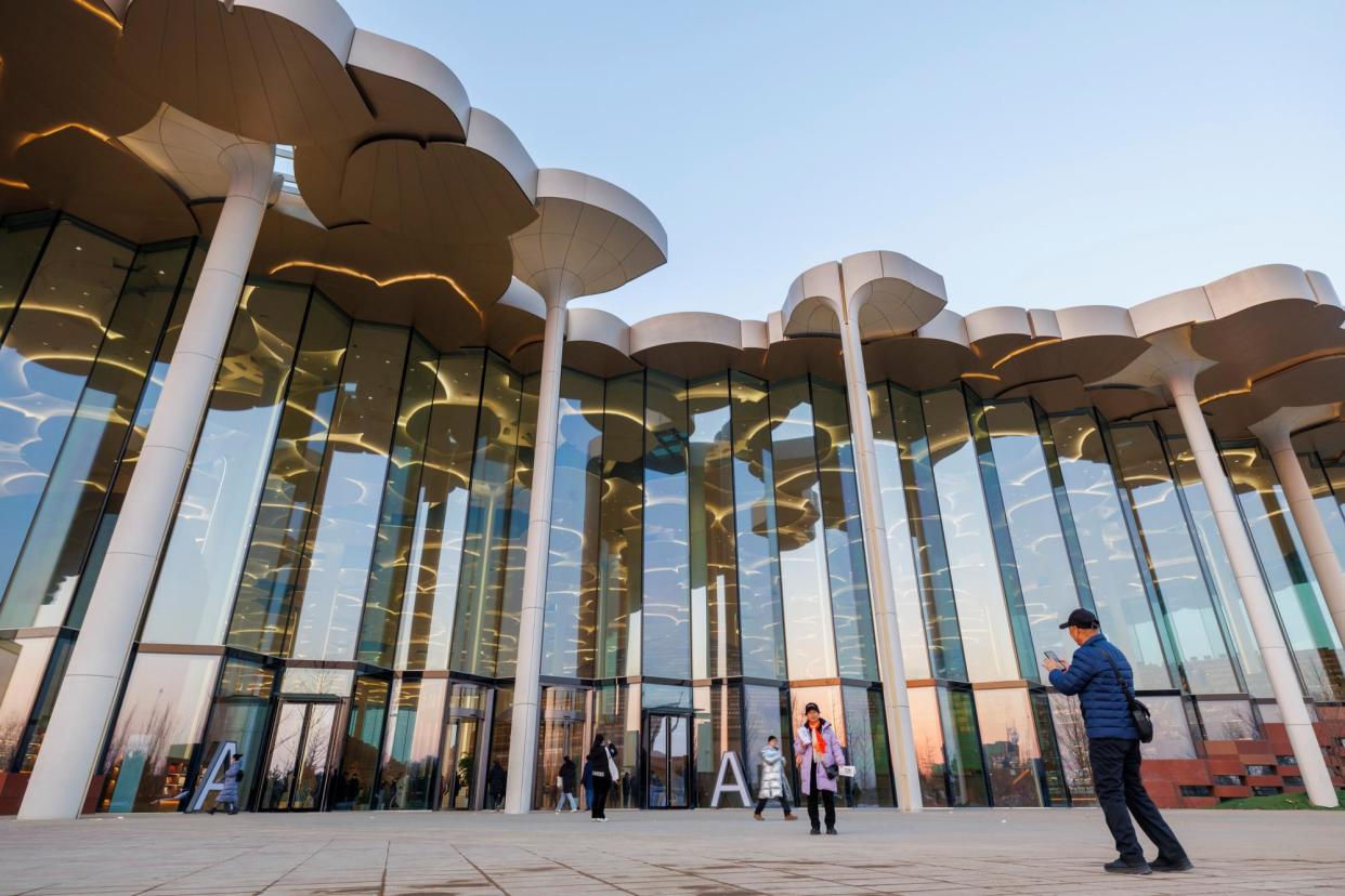 <span>The Beijing Library (pictured) boasts the world’s largest climatised reading space.</span><span>Photograph: VCG/Getty Images</span>